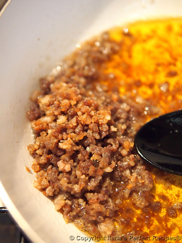 crispy pancetta bolognese sauce closeup